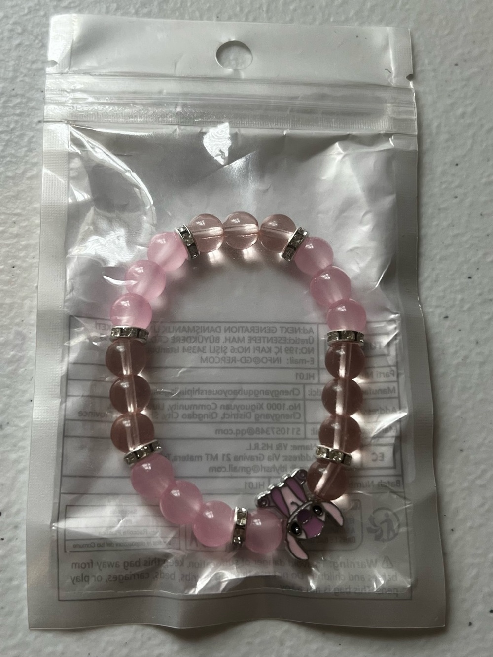 Pink Bead Stretch Bracelet with Stitch Charm